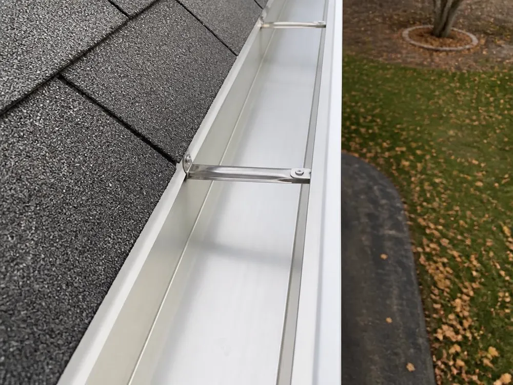 Gutter cleaning — after, clean empty gutter trough