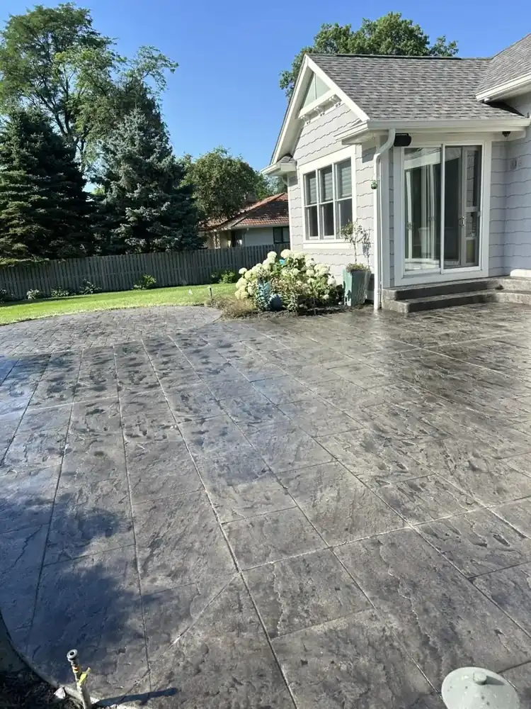 Gray slate stamped concrete patio after cleaning and sealing
